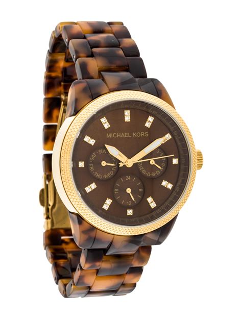 michael kors watch with tortoise shell band|Michael Kors pave bracelet.